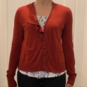 Cute ruffly rust colored cardigan